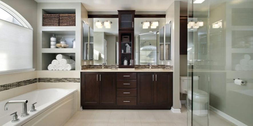 After bathroom remodel - Master bath in luxury home with dark wood cabinetry